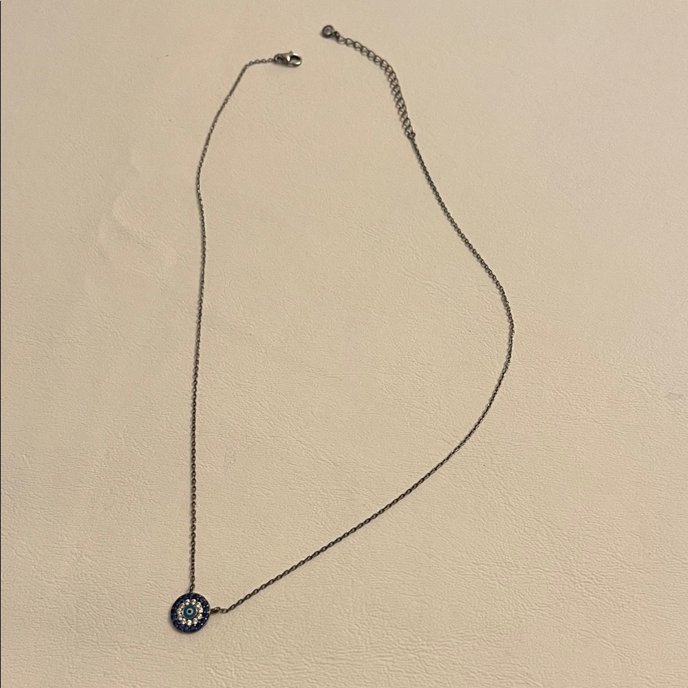 Never worn Blue and silver Evil Eye necklace